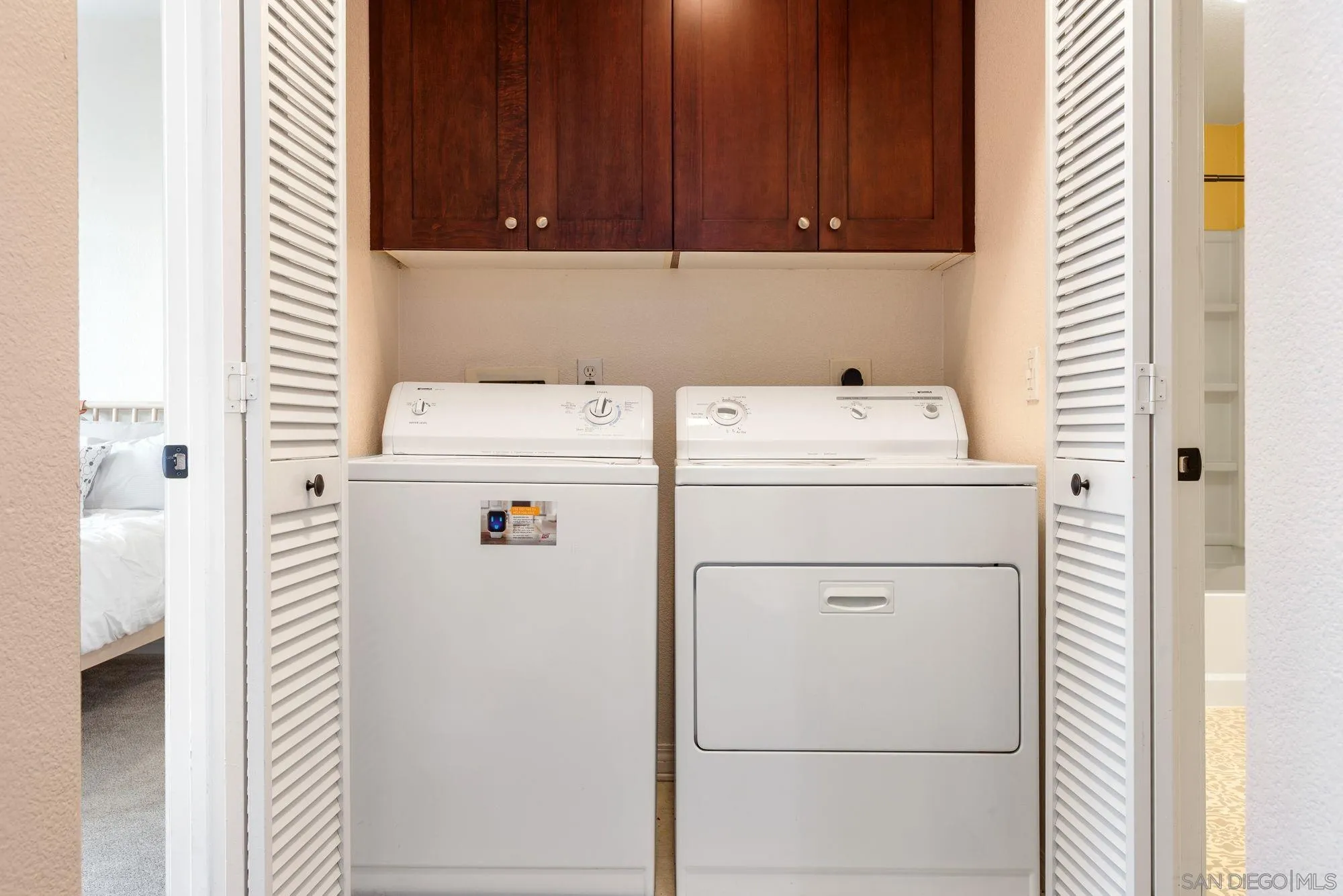 3957 30th Street, Unit 411 San Diego, CA 92104 - Photo 18 of 23 a utility room with dryer and washer