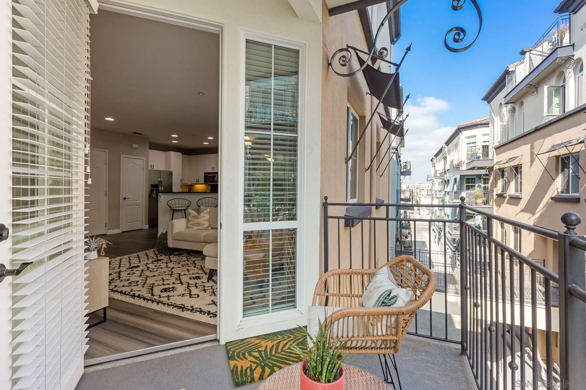 3957 30th Street, Unit 411 San Diego, CA 92104 - Photo 5 of 23 a view of a balcony with furniture