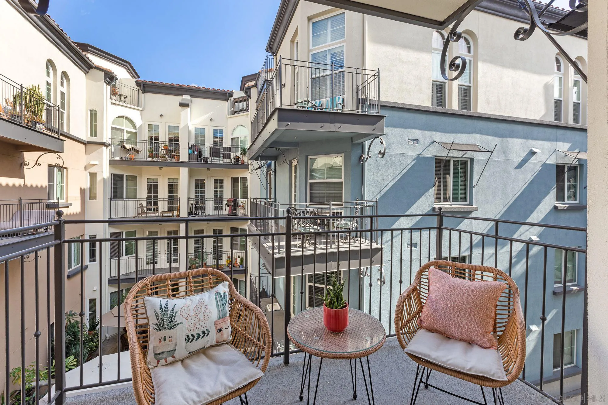 3957 30th Street, Unit 411 San Diego, CA 92104 - Photo 6 of 23 a view of a balcony with furniture