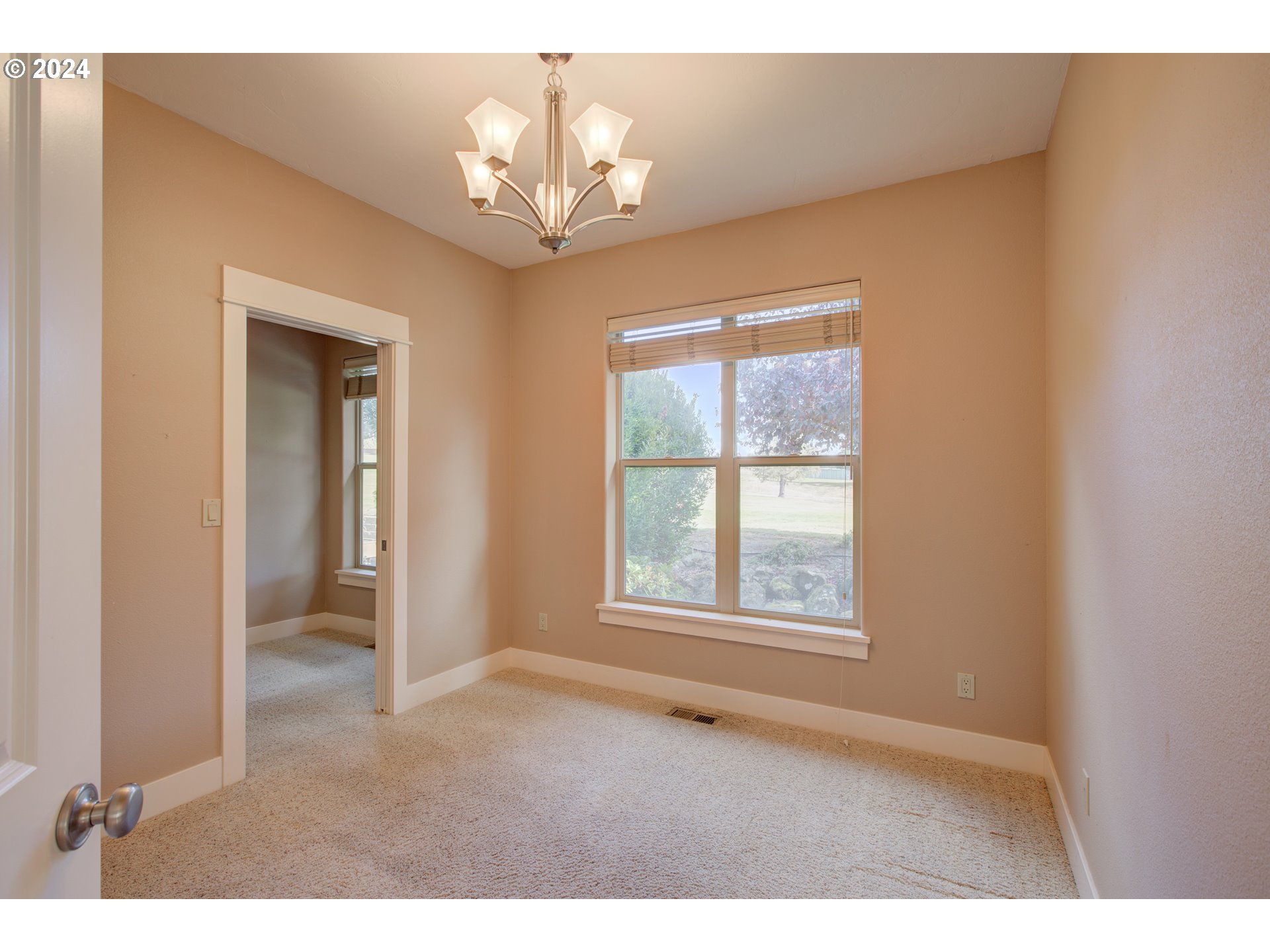 436 Backwater Loop Sutherlin, OR 97479 - Photo 18 of 46 a view of an empty room with a window