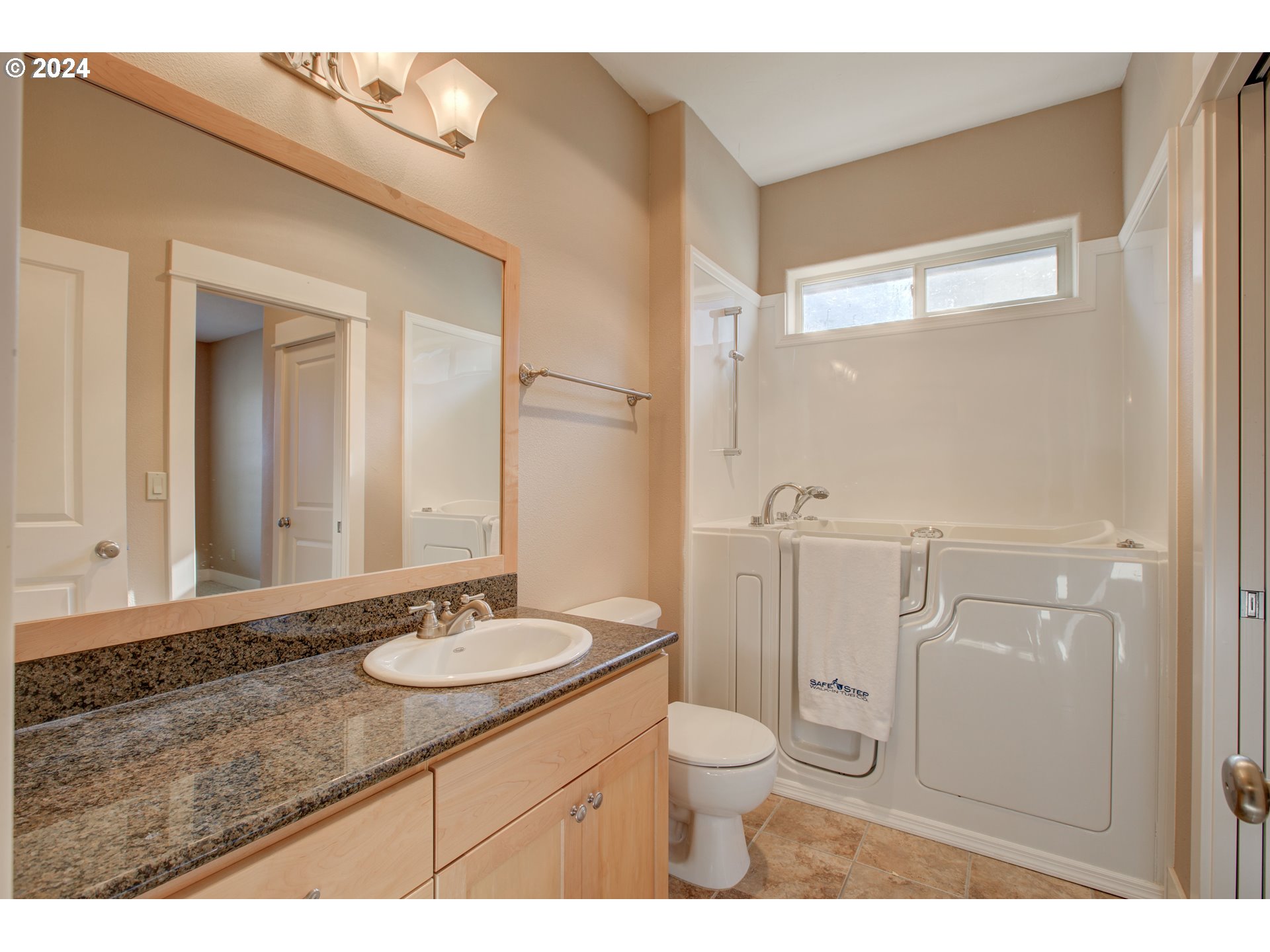 436 Backwater Loop Sutherlin, OR 97479 - Photo 33 of 46 a bathroom with a granite countertop sink toilet a mirror and shower