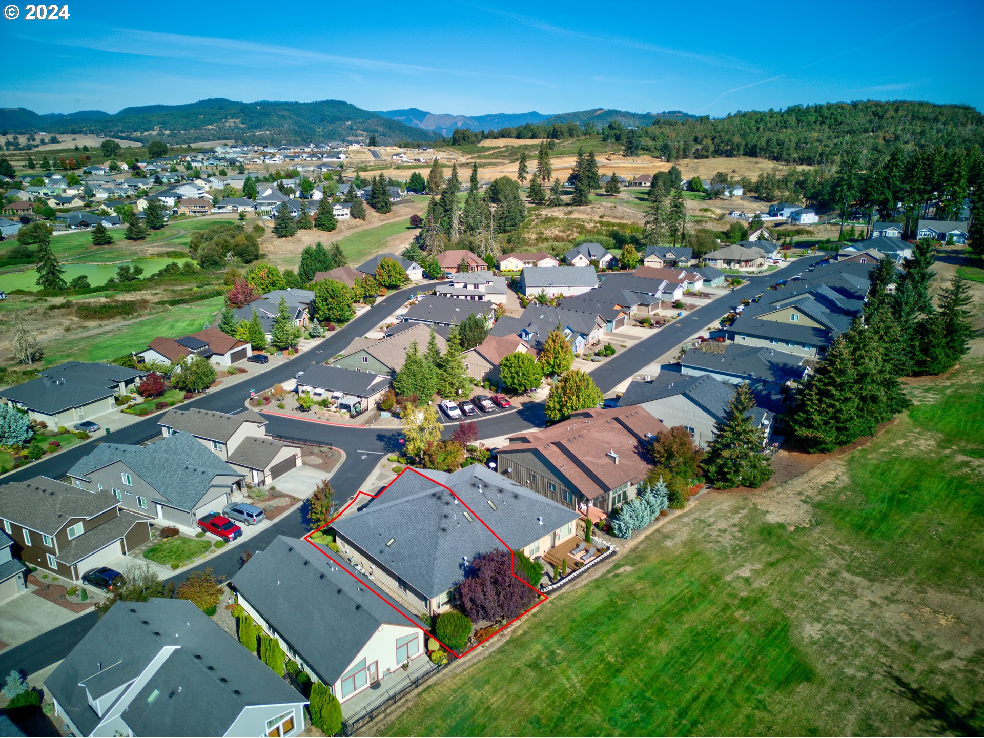 436 Backwater Loop Sutherlin, OR 97479 - Photo 46 of 46 an aerial view of residential houses with outdoor space and river view