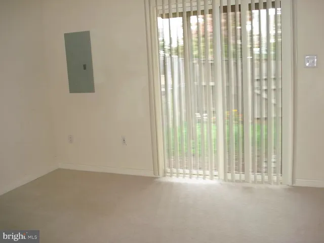 a view of a window in an empty room