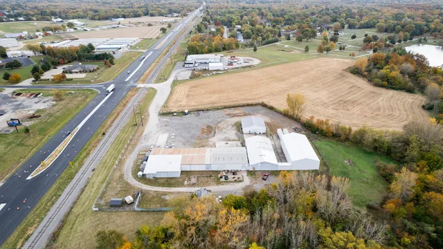 a view of a swimming pool with a yard