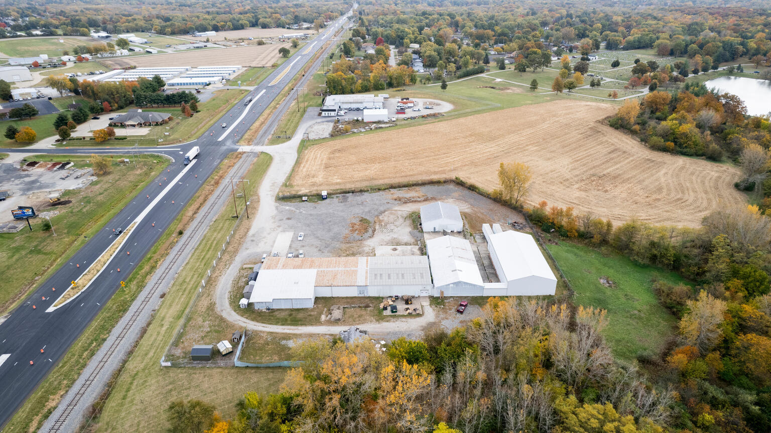 2627 Highway 121 Decatur, IL 62526 - Photo 3 of 13 a view of a swimming pool with a yard