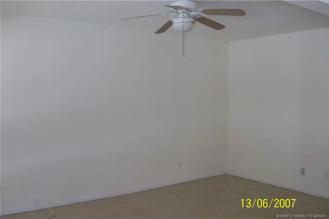 a view of a balcony with a potted plant