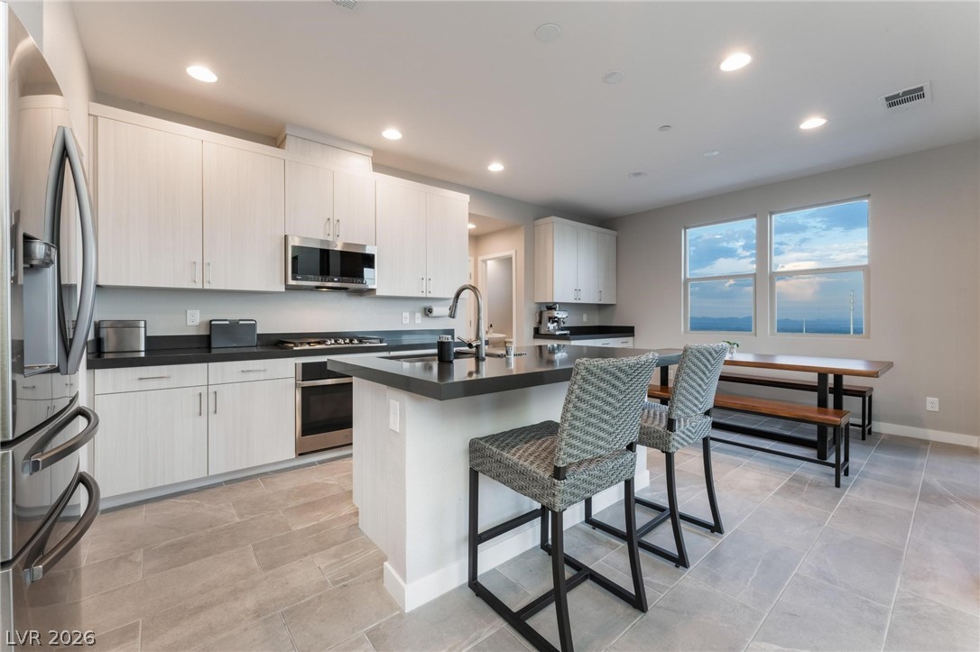 654 Amethyst Point Way Las Vegas, NV 89138 - Photo 18 of 50 2nd Level Kitchen/Dining captures views