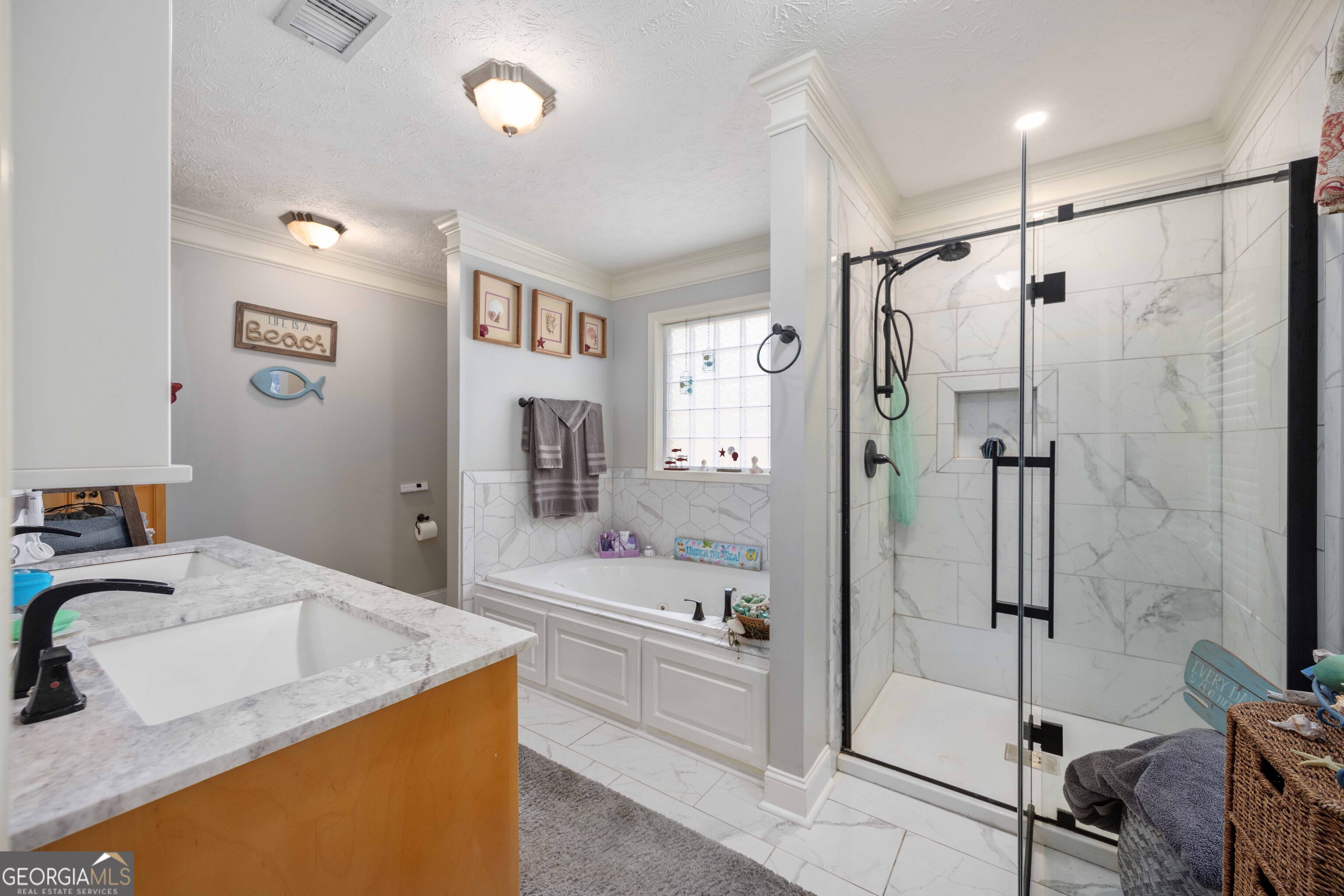 2083 Johnson Mill Road Hamilton, GA 31811 - Photo 12 of 30 a bathroom with a granite countertop sink mirror bathtub and shower