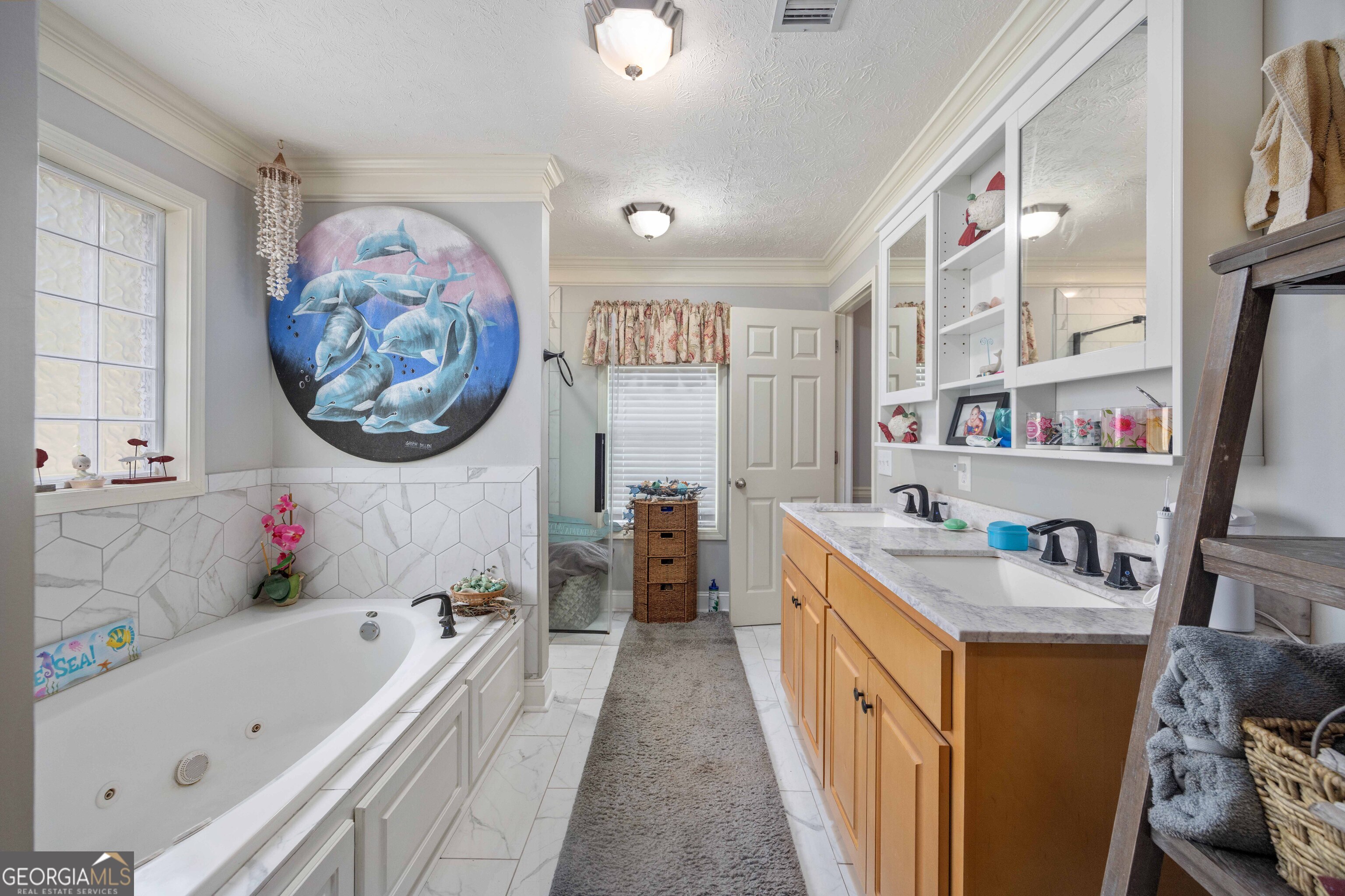 2083 Johnson Mill Road Hamilton, GA 31811 - Photo 13 of 30 a bathroom with a tub sink and a large mirror