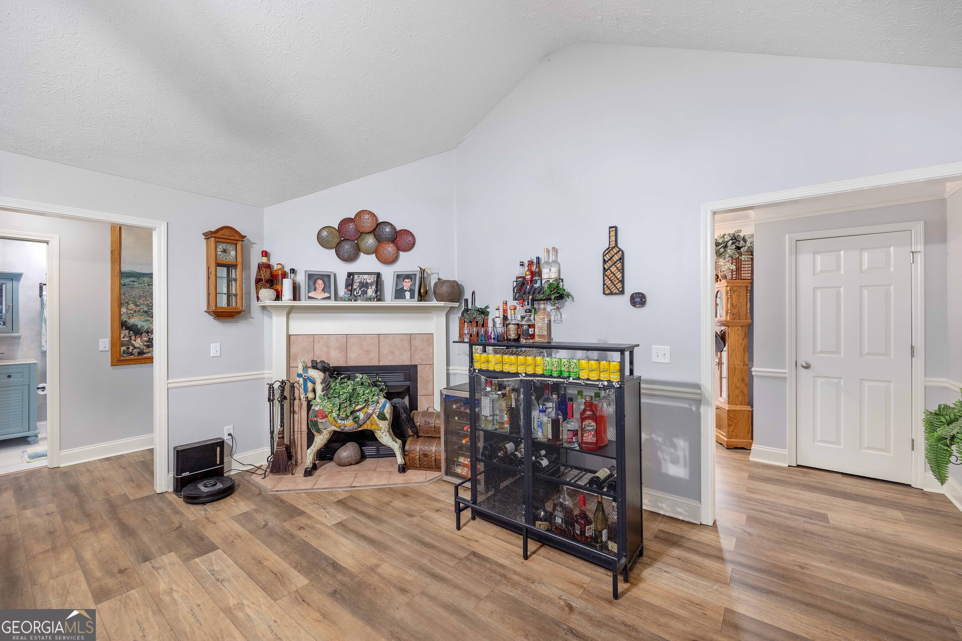 2083 Johnson Mill Road Hamilton, GA 31811 - Photo 16 of 30 a view of game room with furniture and wooden floor