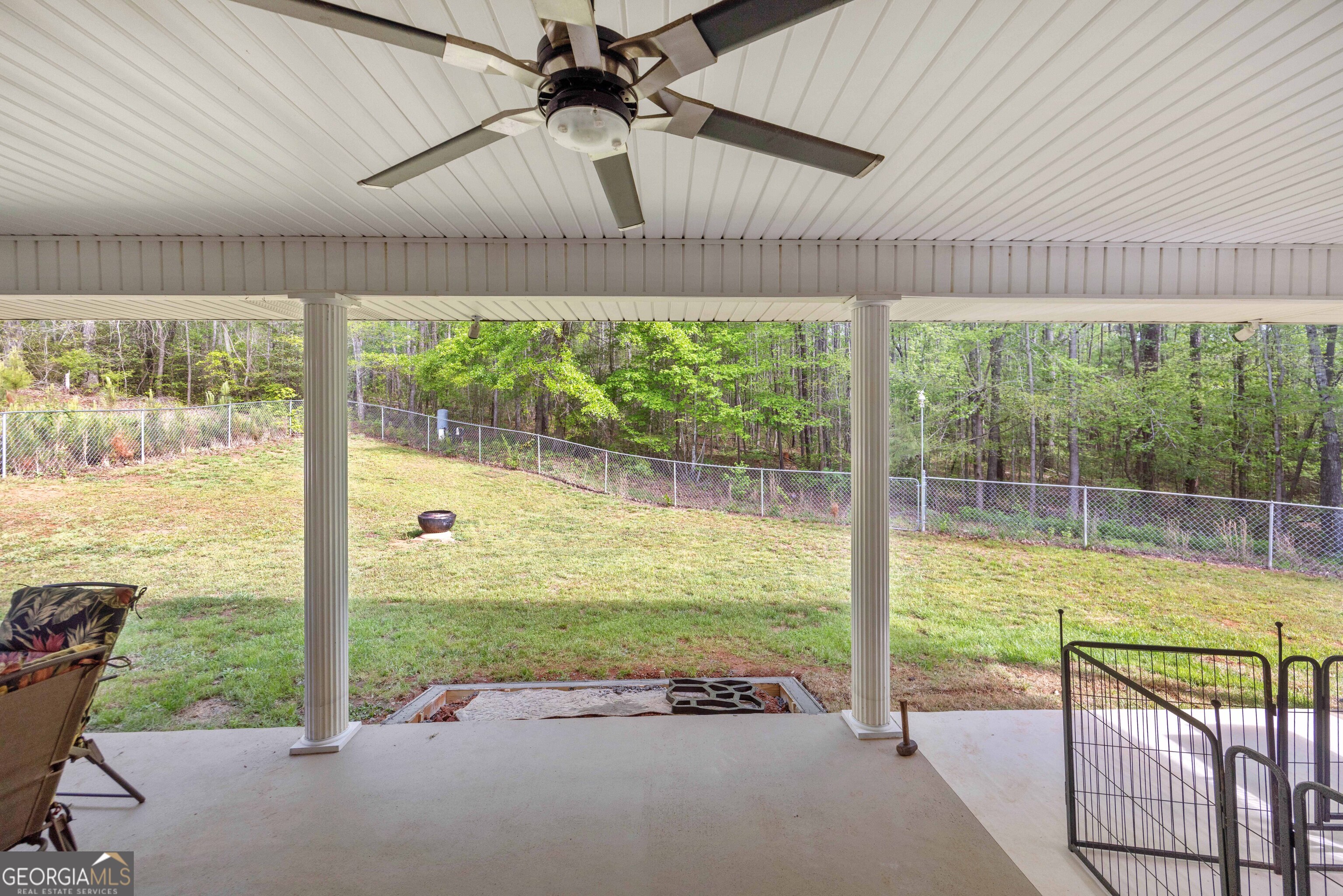 2083 Johnson Mill Road Hamilton, GA 31811 - Photo 23 of 30 a view of a porch with furniture and garden