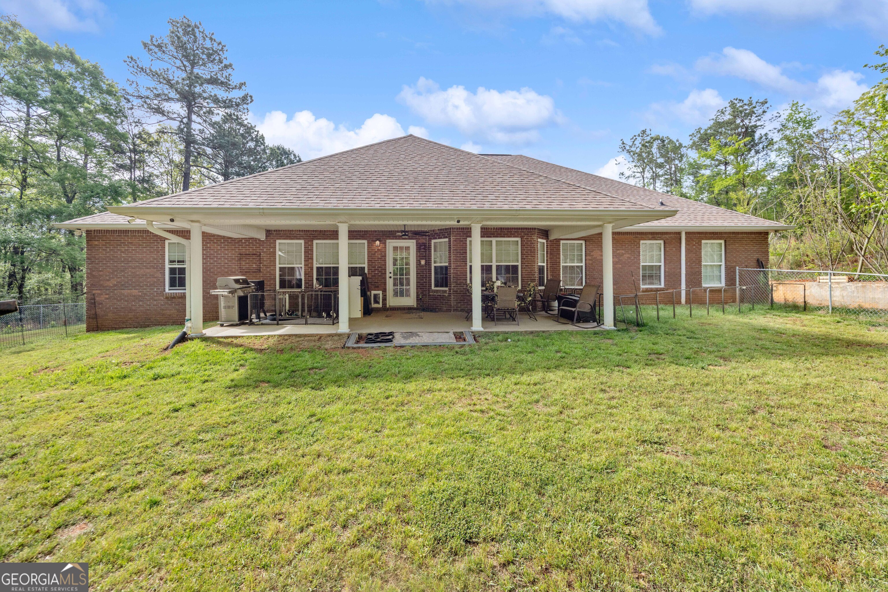 2083 Johnson Mill Road Hamilton, GA 31811 - Photo 25 of 30 a front view of house with yard and green space