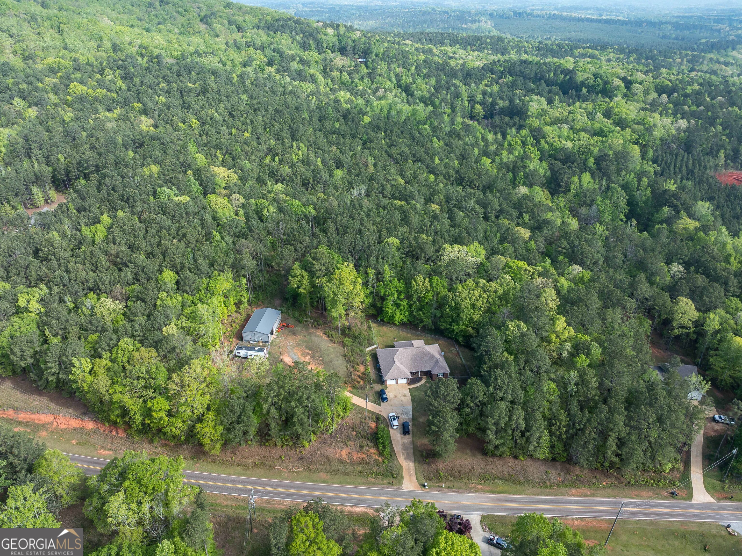 2083 Johnson Mill Road Hamilton, GA 31811 - Photo 28 of 30 an aerial view of a house with yard