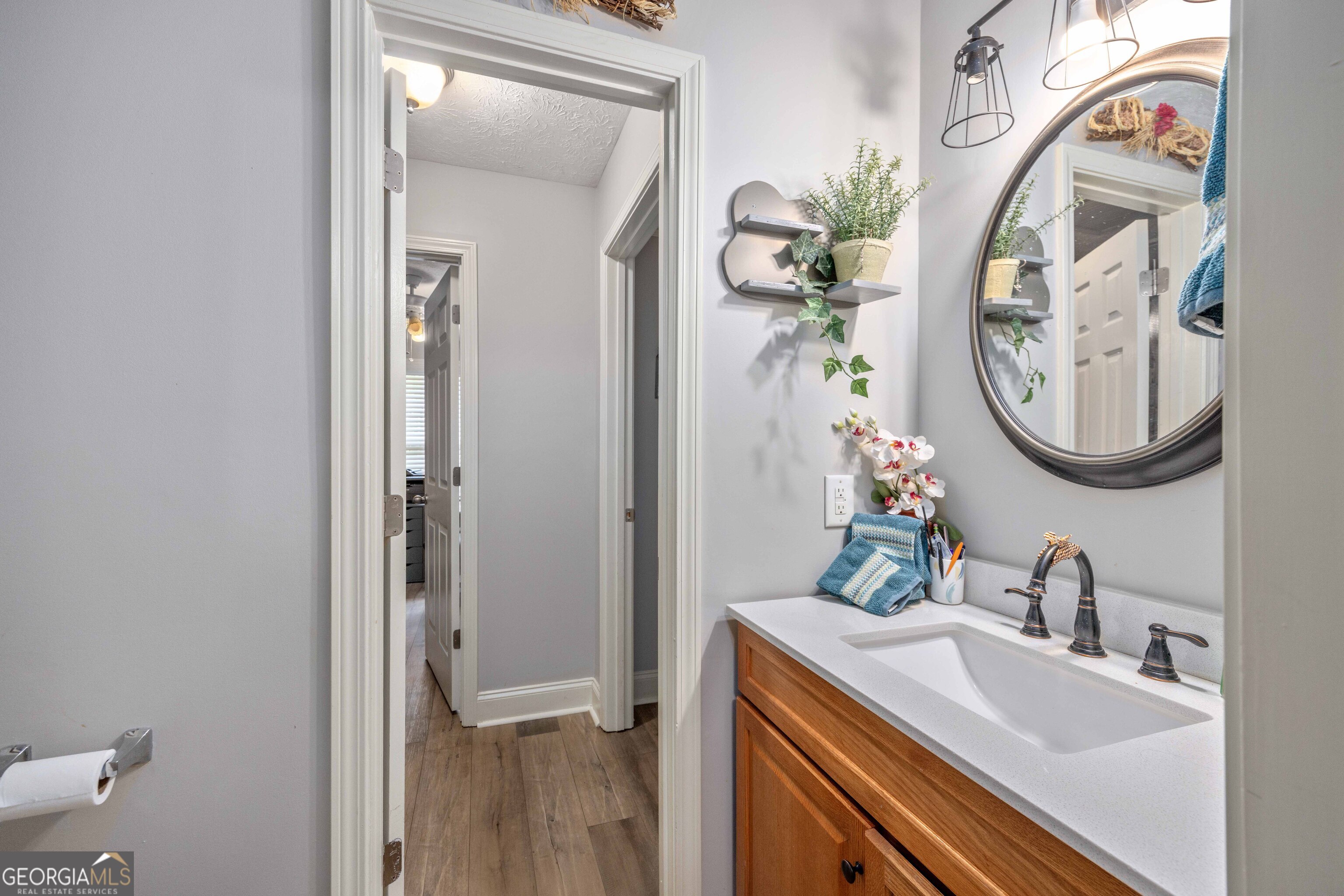 2083 Johnson Mill Road Hamilton, GA 31811 - Photo 4 of 30 a bathroom with a sink and a mirror