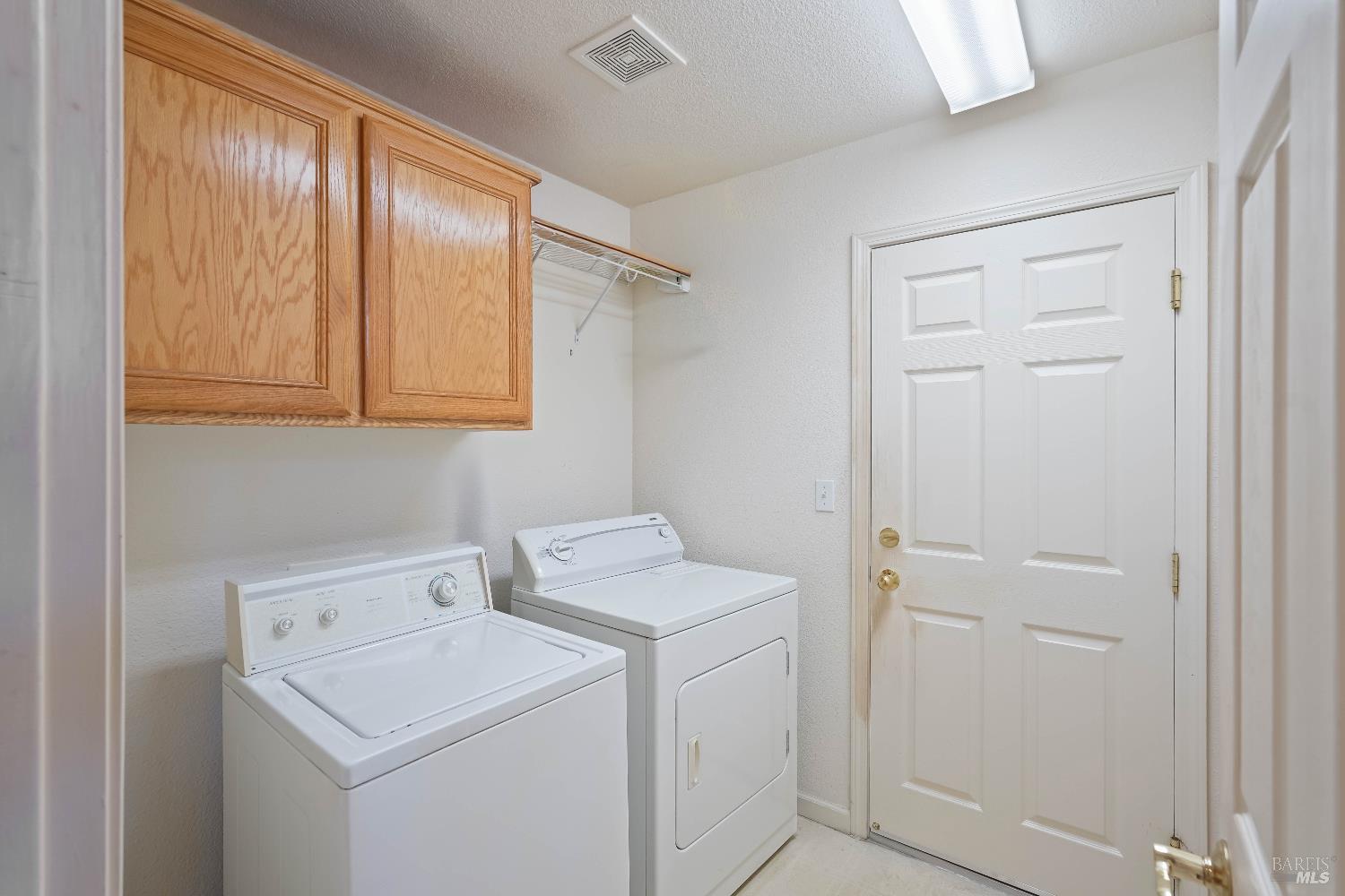 320 Spyglass Drive Rio Vista, CA 94571 - Photo 14 of 48 a utility room with dryer and washer