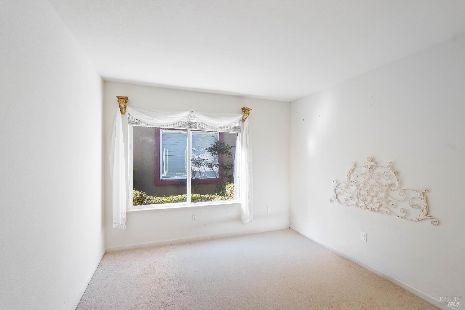 320 Spyglass Drive Rio Vista, CA 94571 - Photo 15 of 48 a view of an empty room with a window