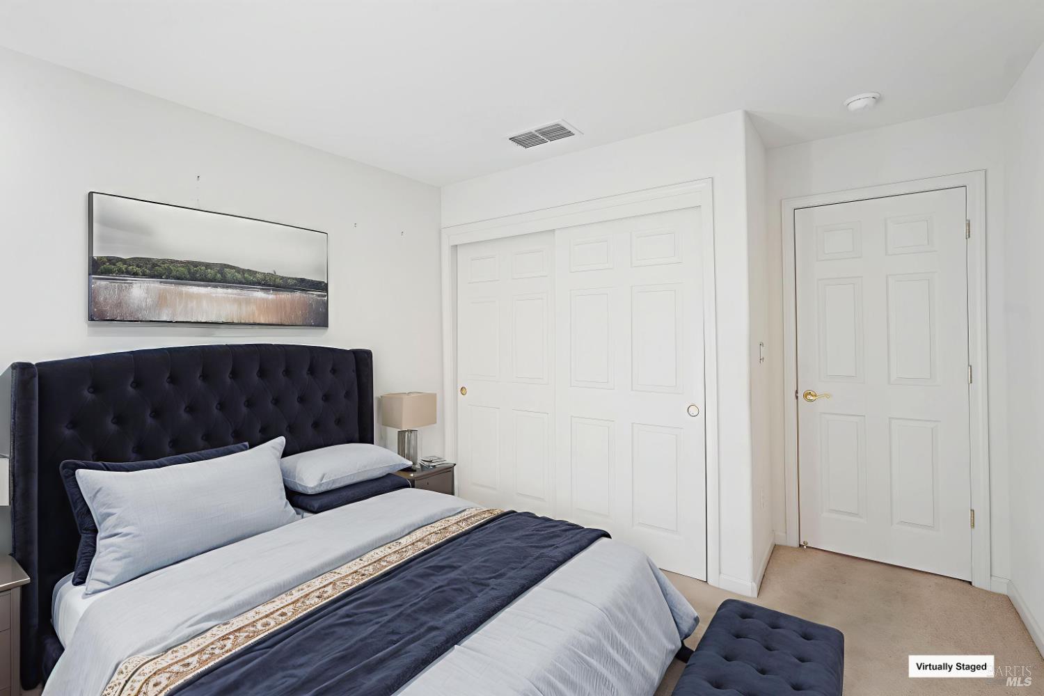 320 Spyglass Drive Rio Vista, CA 94571 - Photo 18 of 48 a bedroom with a bed and a night stand