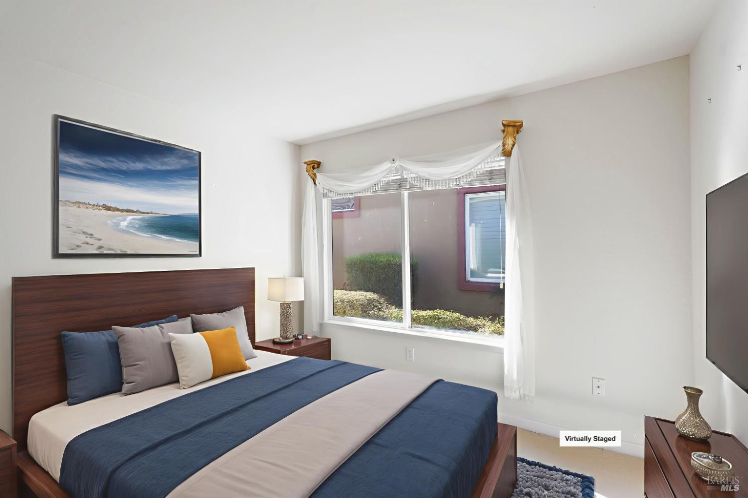 320 Spyglass Drive Rio Vista, CA 94571 - Photo 21 of 48 a bedroom with a large bed and a window