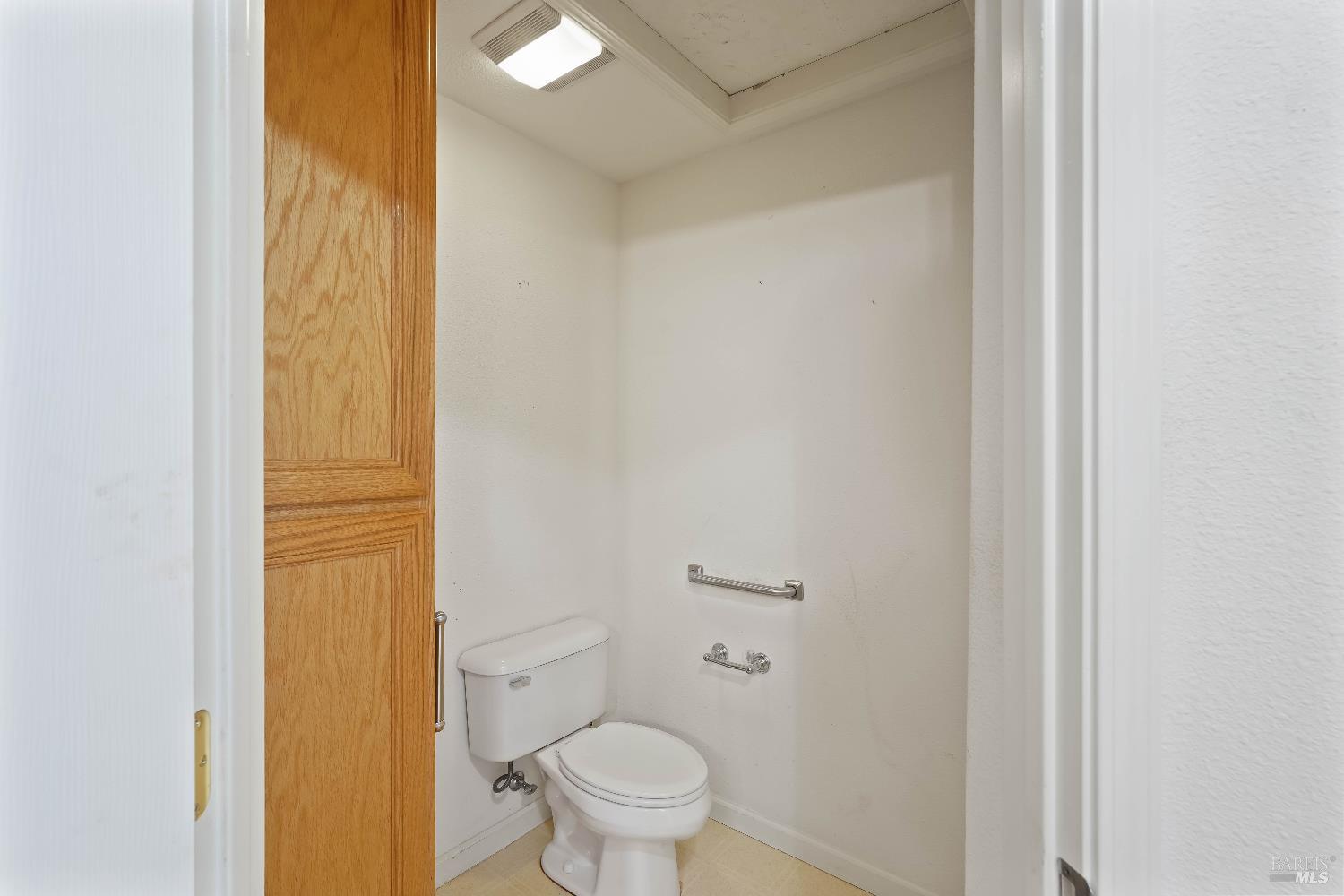 320 Spyglass Drive Rio Vista, CA 94571 - Photo 38 of 48 a bathroom with a granite countertop toilet and a sink