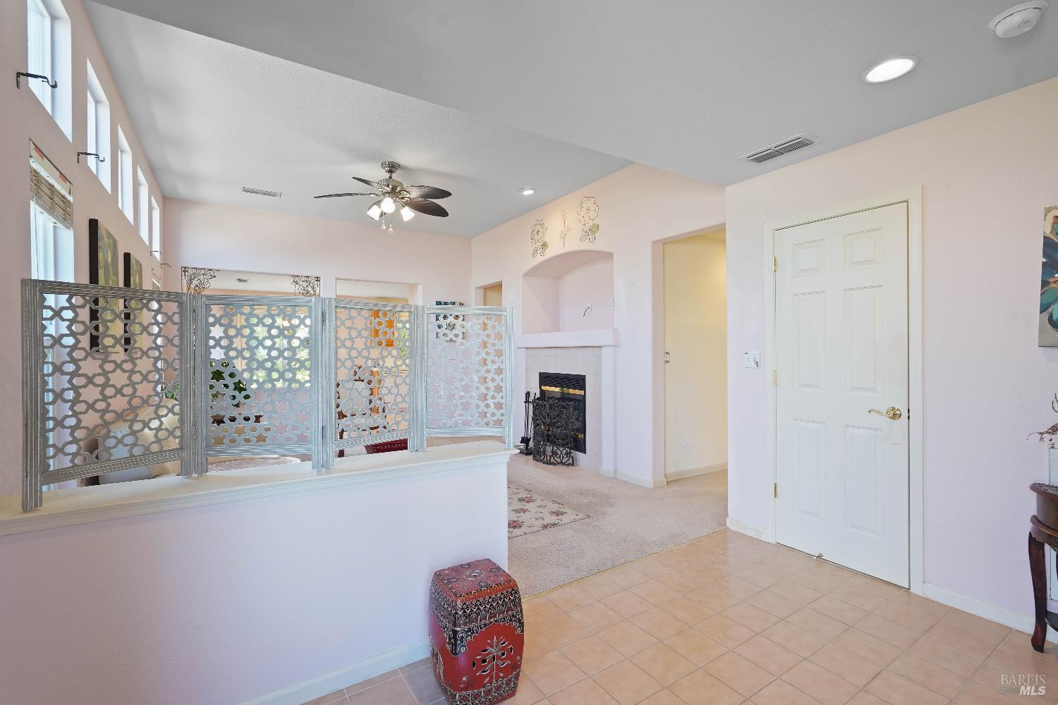 320 Spyglass Drive Rio Vista, CA 94571 - Photo 4 of 48 a living room with furniture a fireplace and a chandelier