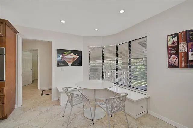 a workspace with furniture and window