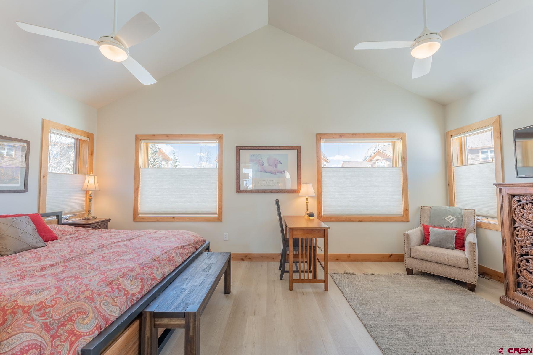 231 Elk Valley Road, Unit 2D Crested Butte, CO 81224 - Photo 16 of 35 a living room with furniture and a window