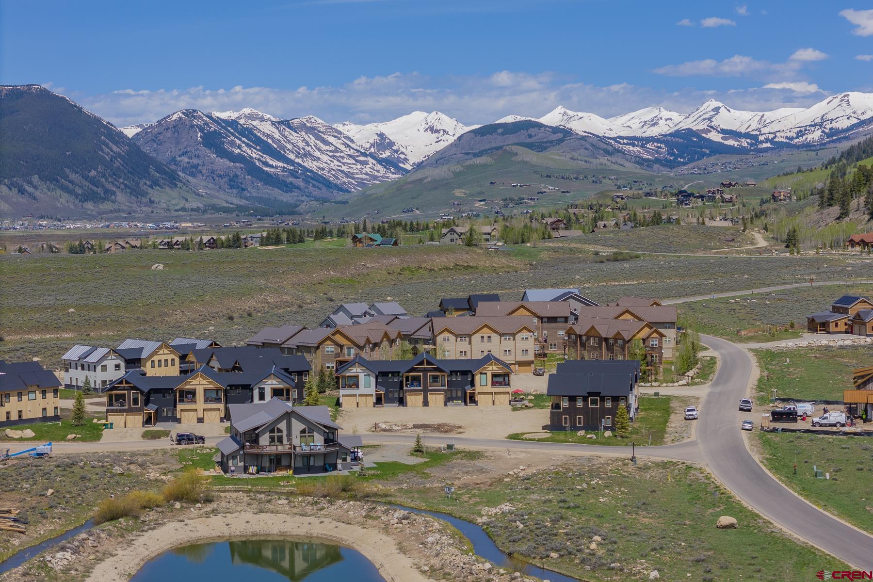 231 Elk Valley Road, Unit 2D Crested Butte, CO 81224 - Photo 31 of 35 a view of a ocean with a mountain in the background