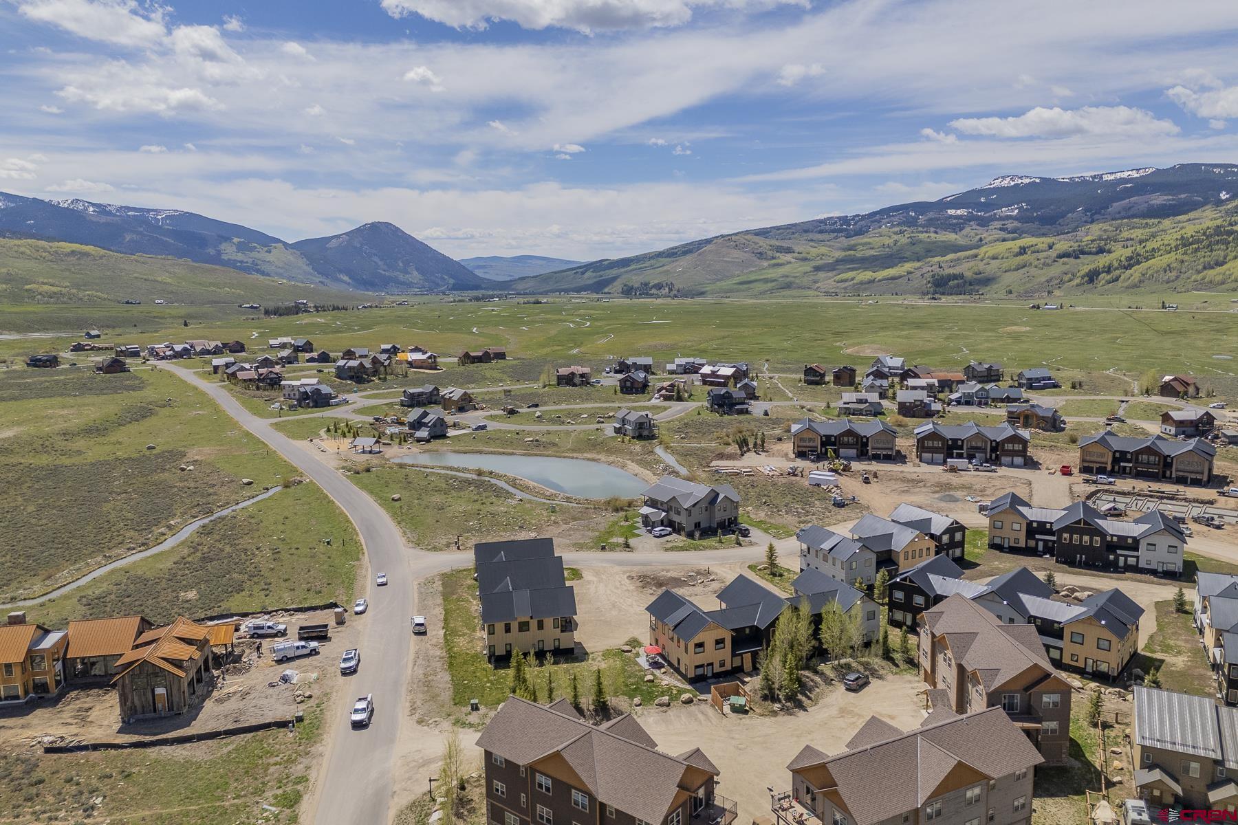231 Elk Valley Road, Unit 2D Crested Butte, CO 81224 - Photo 35 of 35 a view of a city with mountains in the background