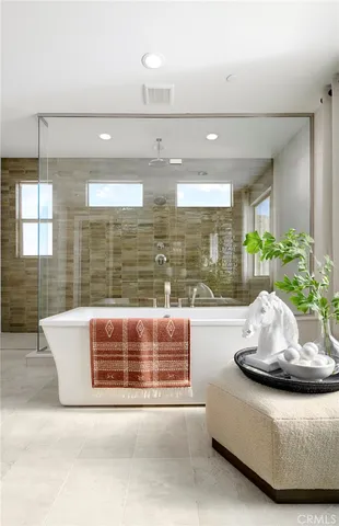 a view of a room with a large window and table