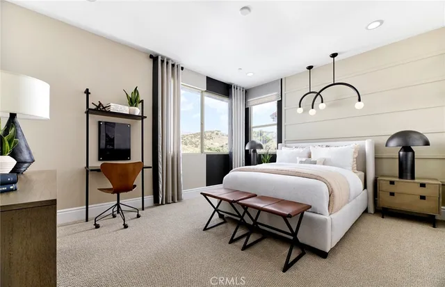 a bedroom with bed and a window