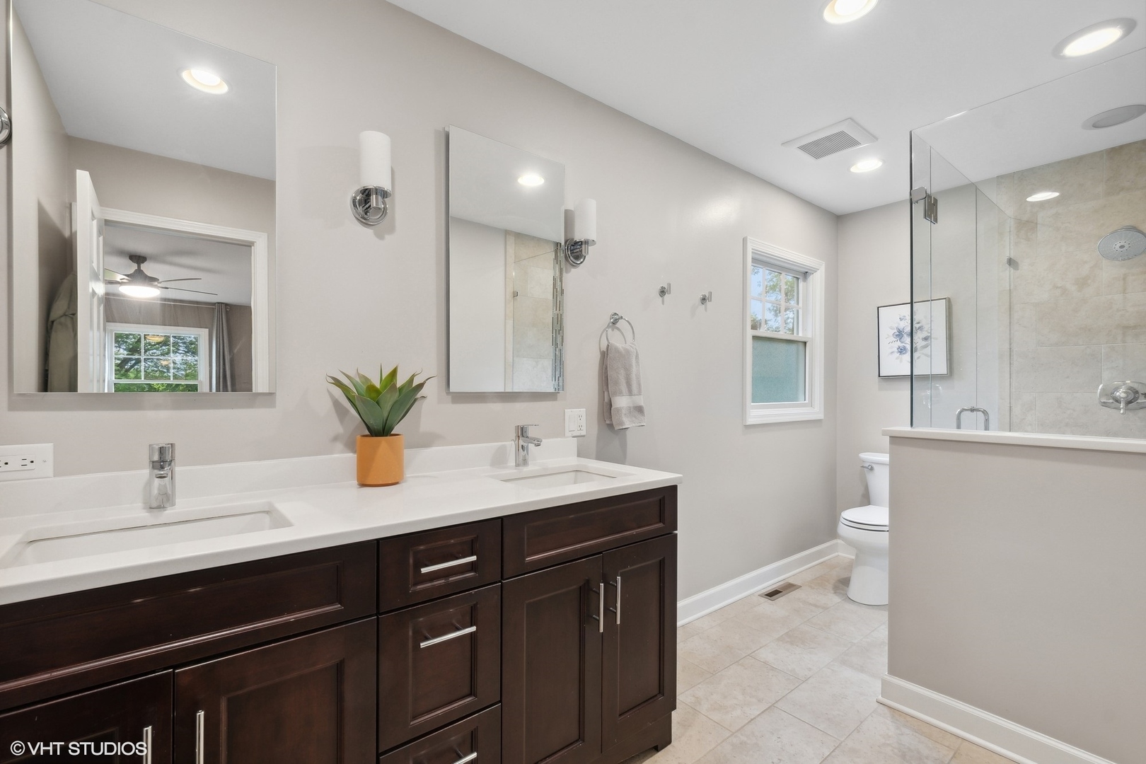 580 East Old Elm Road Lake Forest, IL 60045 - Photo 11 of 23 a spacious bathroom with a granite countertop sink mirror and a toilet