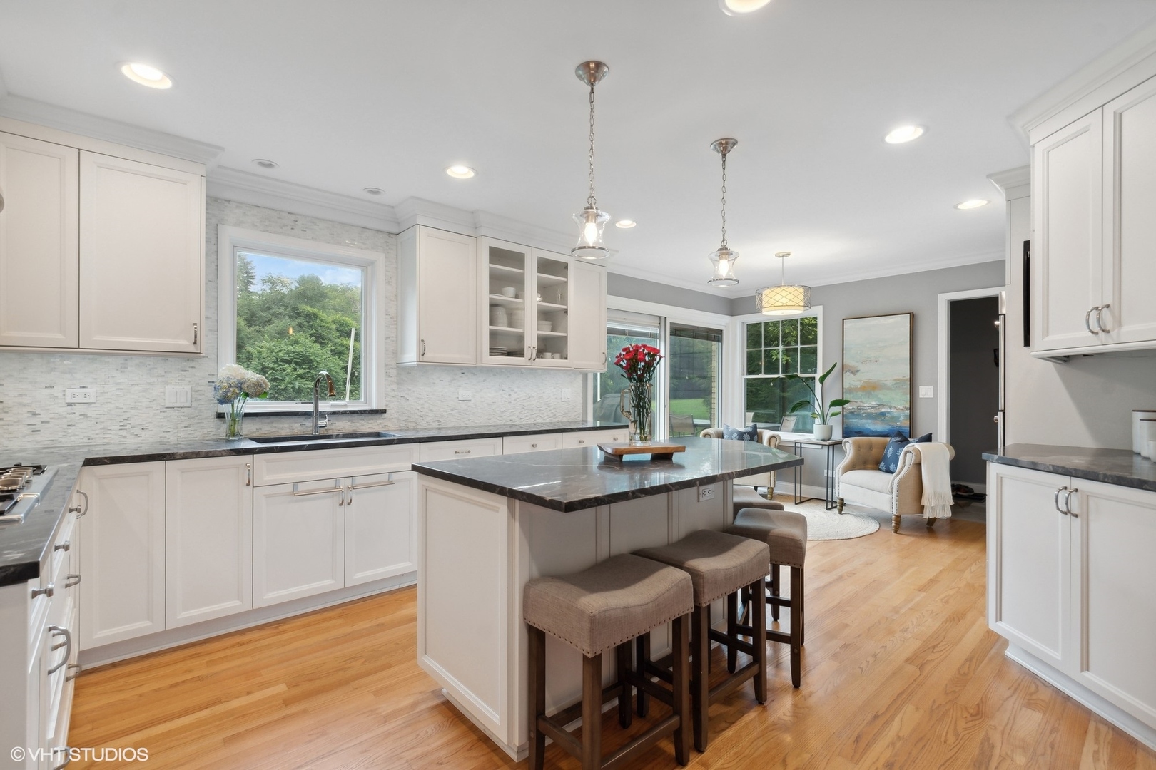 580 East Old Elm Road Lake Forest, IL 60045 - Photo 2 of 23 a kitchen with stainless steel appliances granite countertop a stove and more cabinets