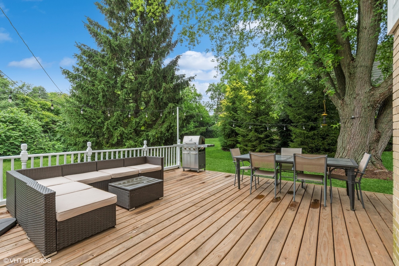 580 East Old Elm Road Lake Forest, IL 60045 - Photo 5 of 23 a view of a chairs and table on the wooden deck