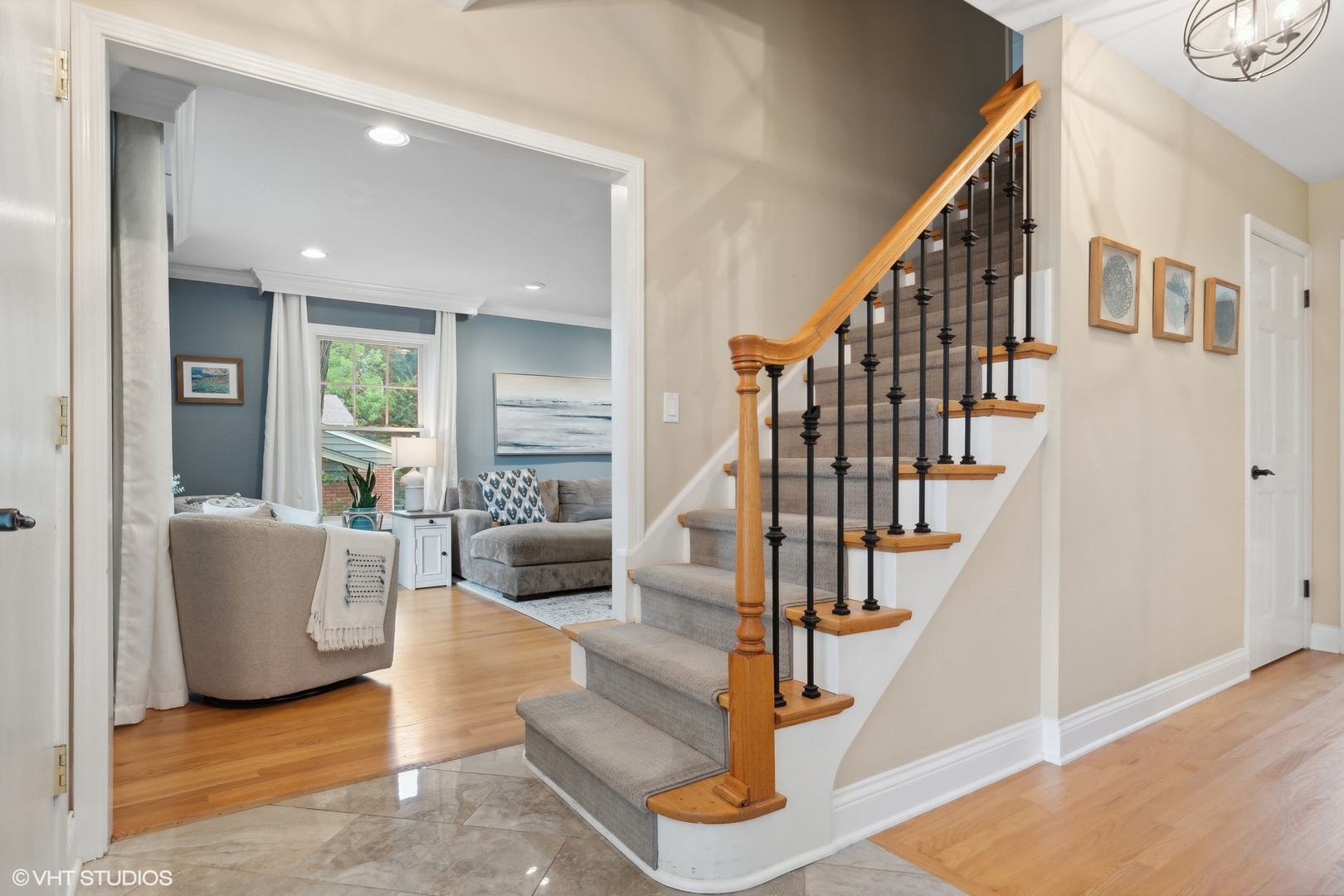 580 East Old Elm Road Lake Forest, IL 60045 - Photo 7 of 23 a view of entryway and hall with wooden floor