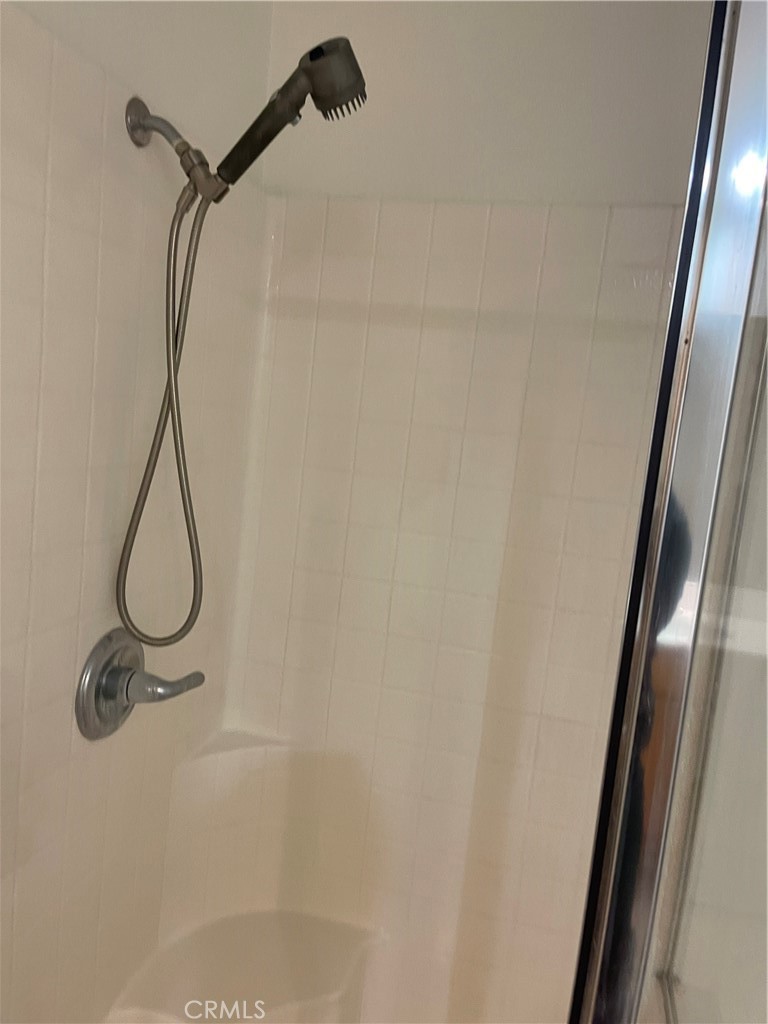 4438 Leonard Court Riverside, CA 92501 - Photo 23 of 36 a bathroom with a shower