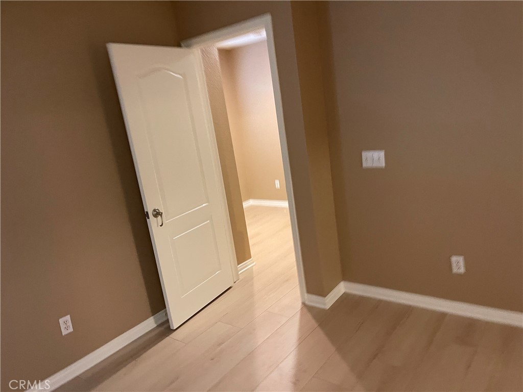 4438 Leonard Court Riverside, CA 92501 - Photo 25 of 36 view of a room with door