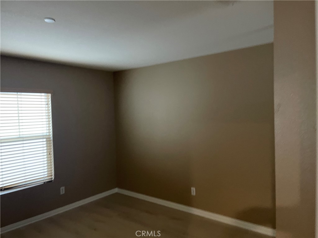 4438 Leonard Court Riverside, CA 92501 - Photo 28 of 36 an empty room with a window