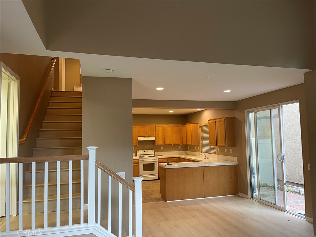 4438 Leonard Court Riverside, CA 92501 - Photo 5 of 36 a view of kitchen with wooden floor