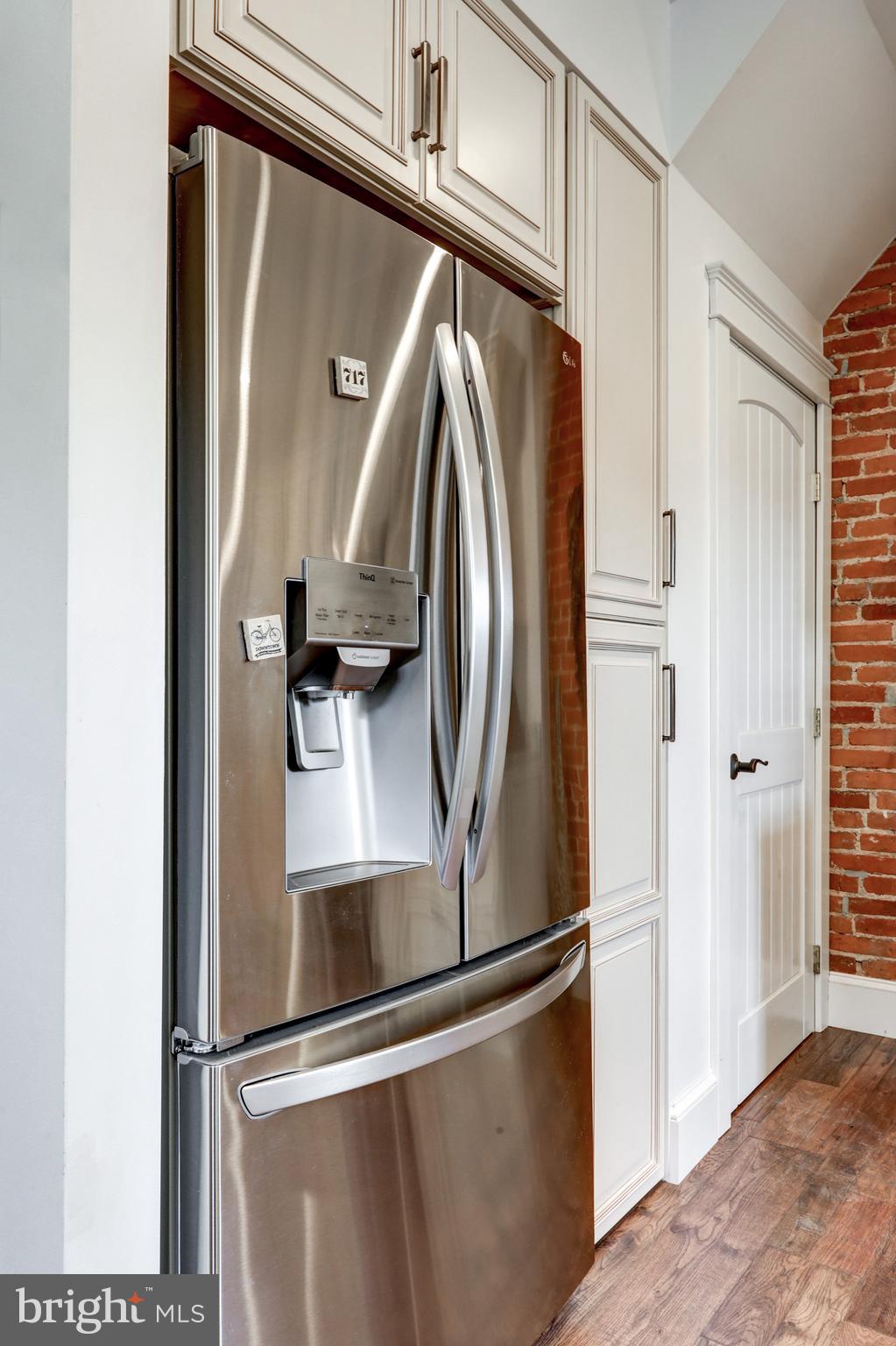 354 New Holland Avenue Lancaster, PA 17602 - Photo 17 of 43 a metallic refrigerator freezer sitting in a kitchen