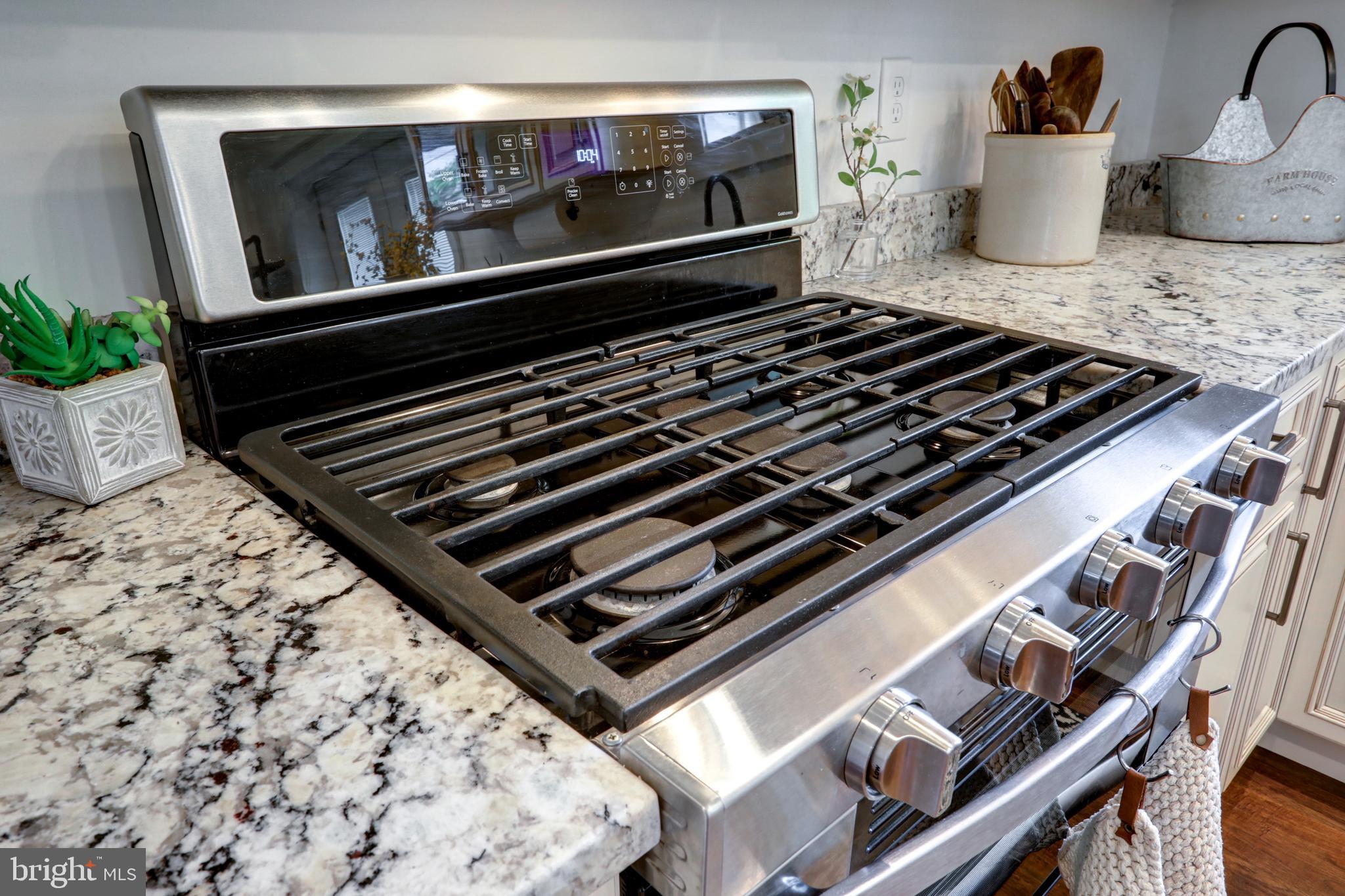 354 New Holland Avenue Lancaster, PA 17602 - Photo 18 of 43 a stove top oven sitting inside of a kitchen