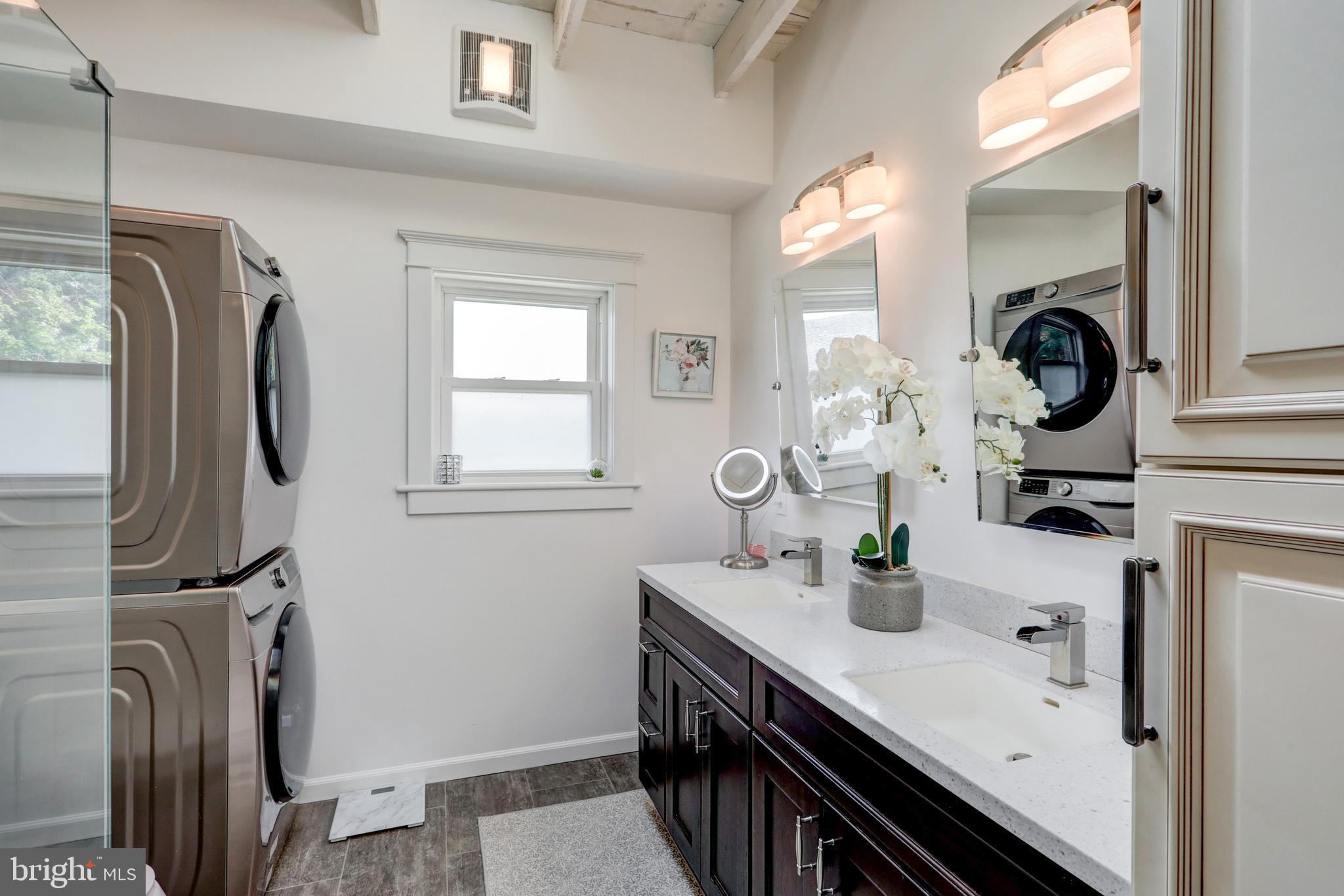 354 New Holland Avenue Lancaster, PA 17602 - Photo 22 of 43 a bathroom with a sink double vanity and a mirror