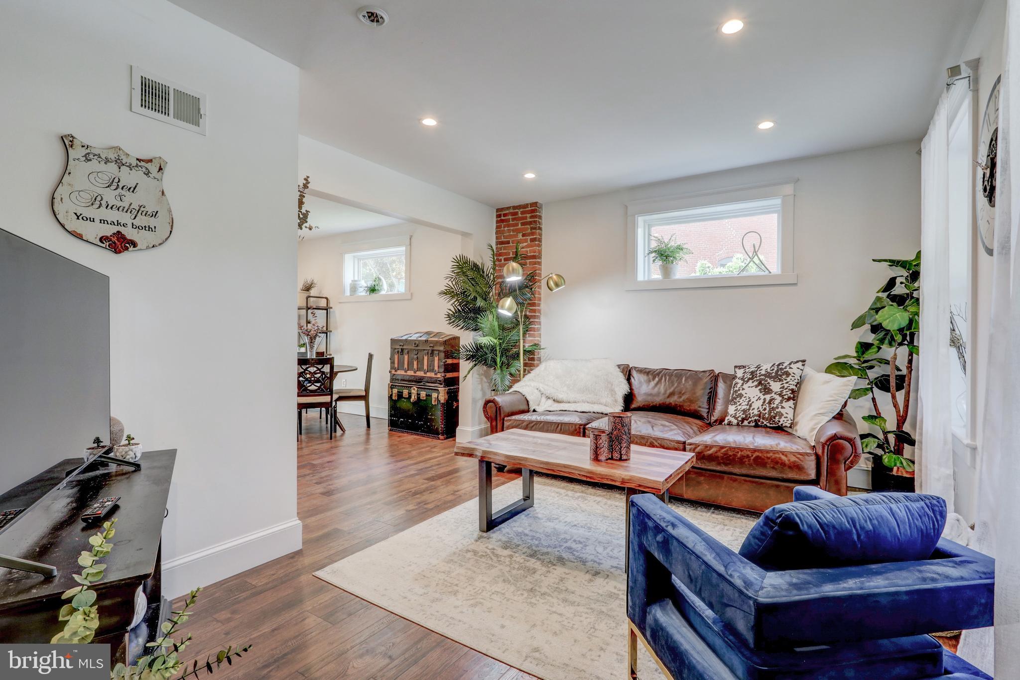 354 New Holland Avenue Lancaster, PA 17602 - Photo 4 of 43 a living room with furniture and wooden floor