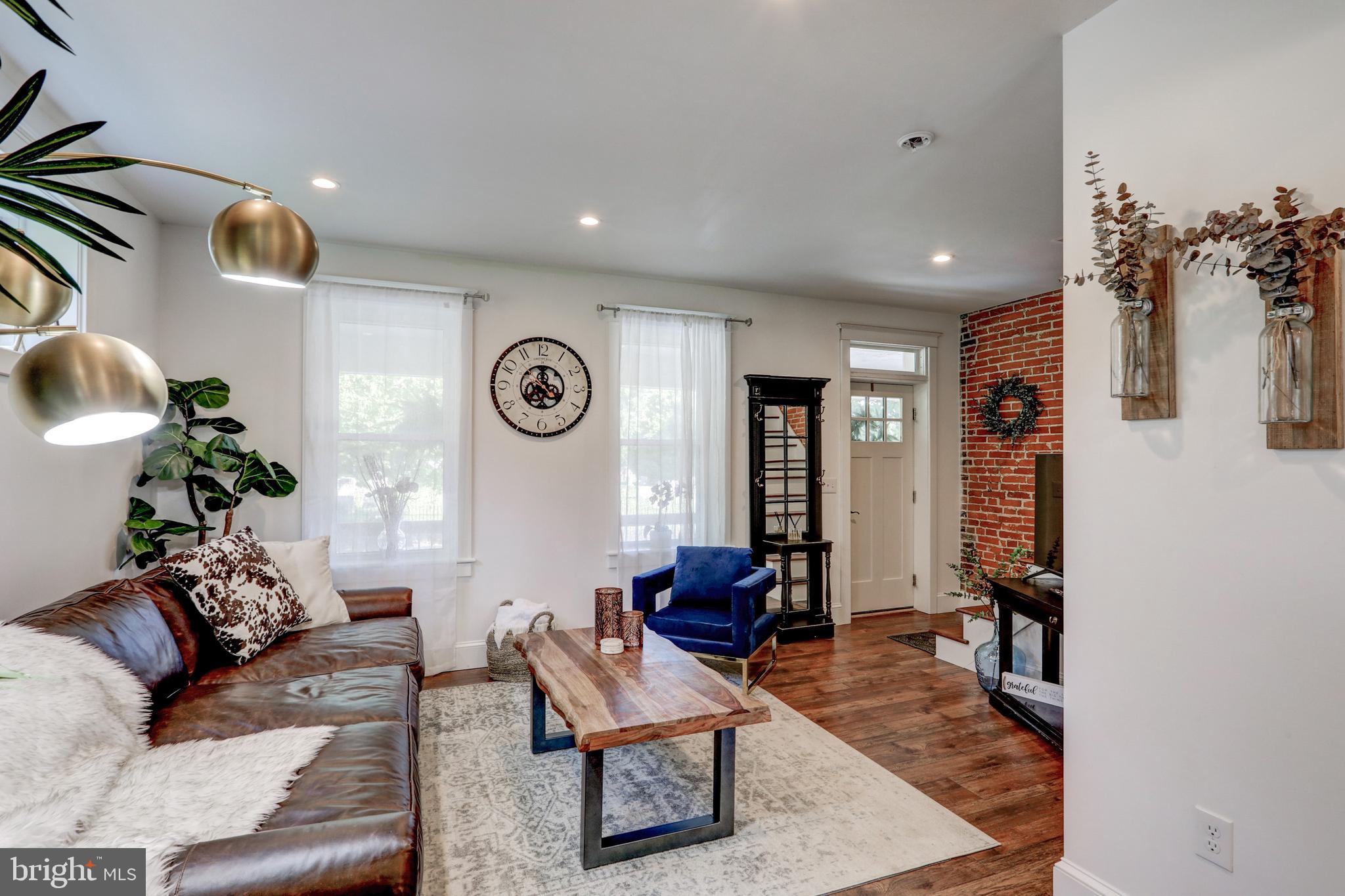 354 New Holland Avenue Lancaster, PA 17602 - Photo 5 of 43 a living room with furniture and wooden floor