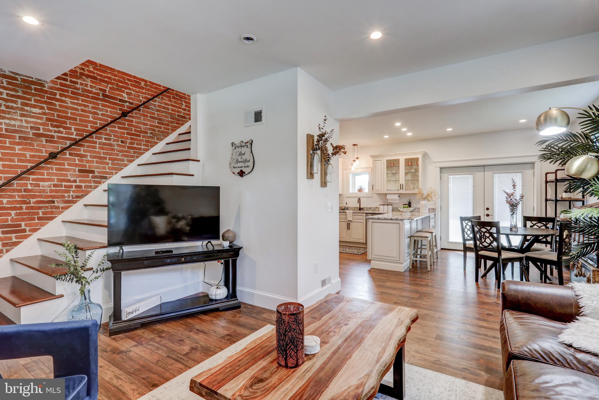 354 New Holland Avenue Lancaster, PA 17602 - Photo 7 of 43 a living room with furniture and a wooden floor