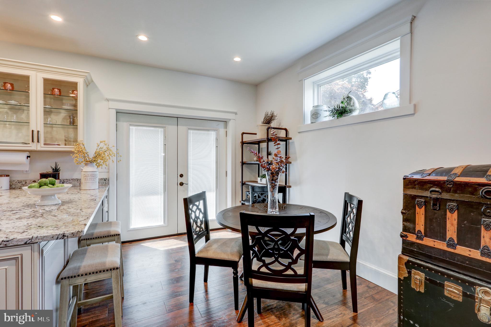 354 New Holland Avenue Lancaster, PA 17602 - Photo 8 of 43 a view of a dining room with furniture window and wooden floor