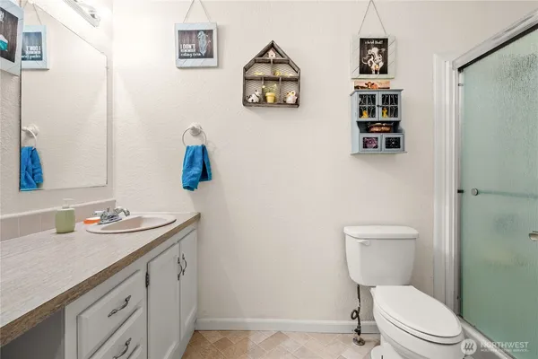 a view of a porch with chairs and backyard