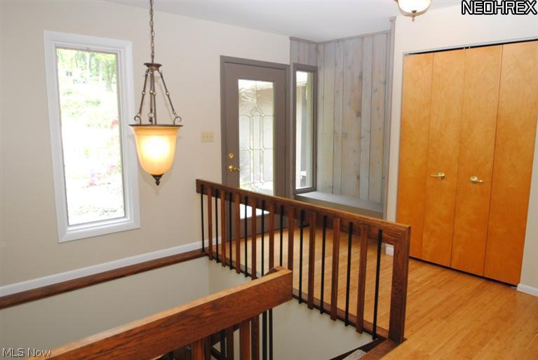 4846 Ranchwood Road Akron, OH 44333 - Photo 2 of 23 A light filled foyer with bamboo floor welcomes you.