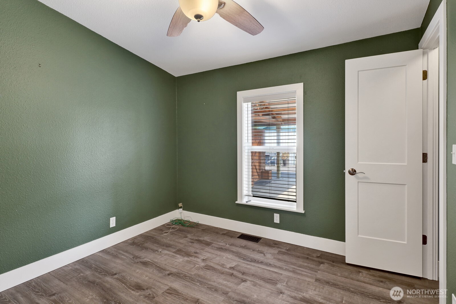 3240 Douglas Road Ferndale, WA 98248 - Photo 12 of 40 an empty room with wooden floor closet and windows