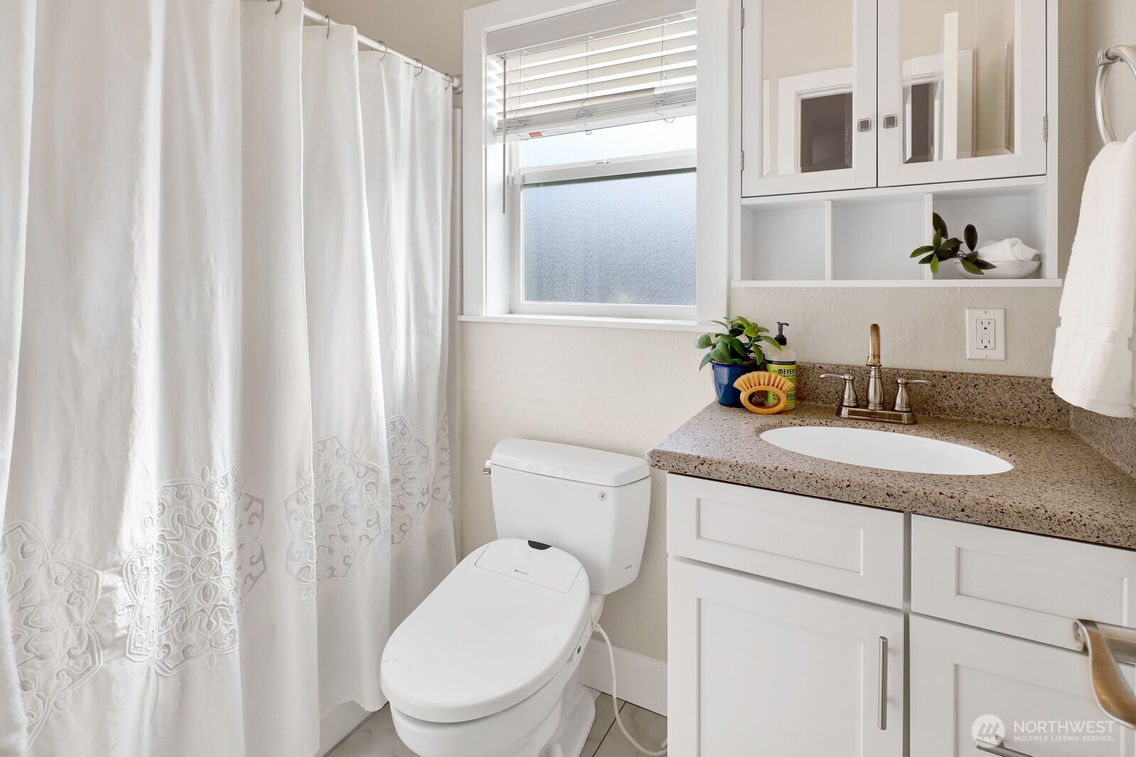 3240 Douglas Road Ferndale, WA 98248 - Photo 14 of 40 a bathroom with a granite countertop sink vanity mirror and toilet
