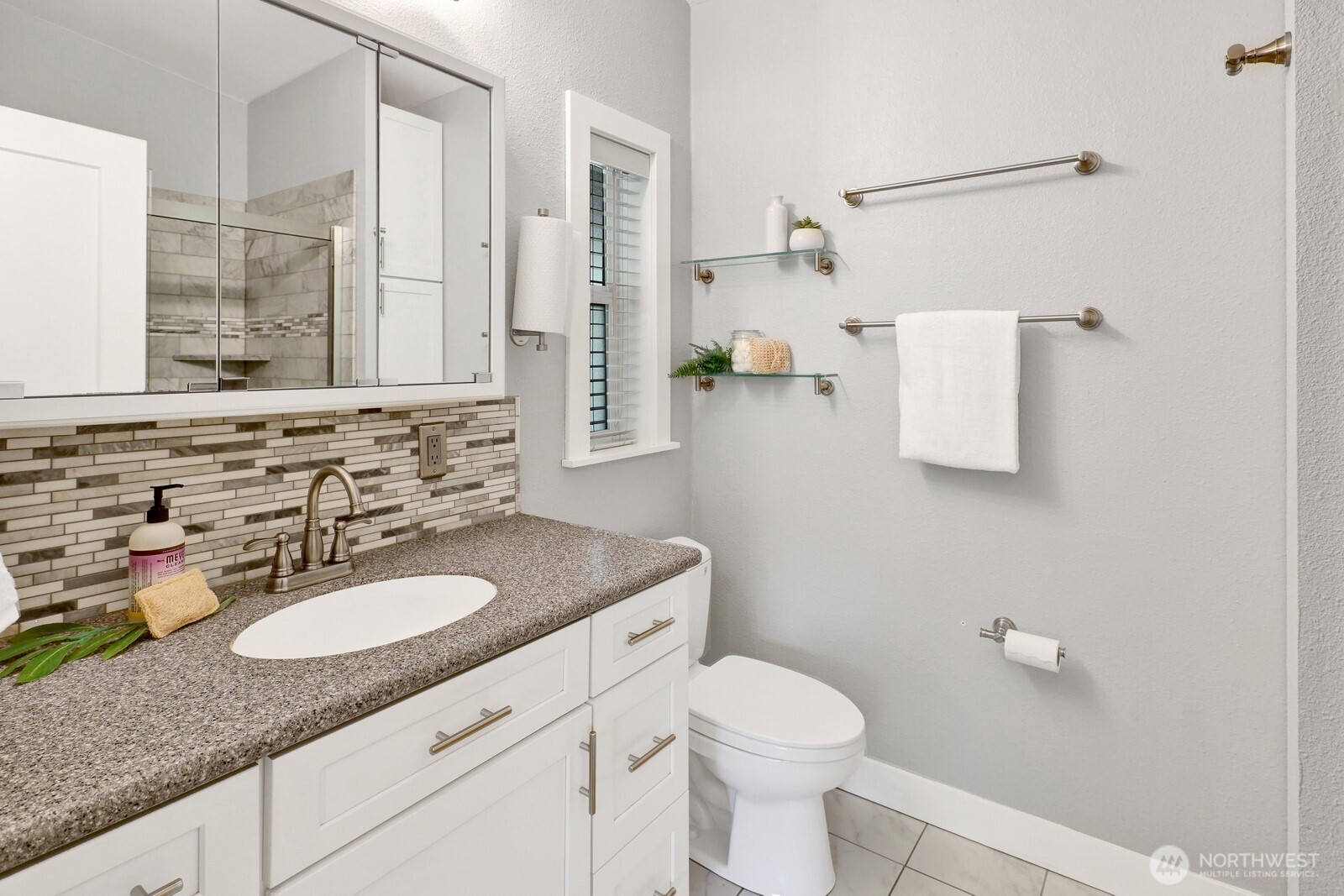 3240 Douglas Road Ferndale, WA 98248 - Photo 19 of 40 a bathroom with a granite countertop sink and a mirror